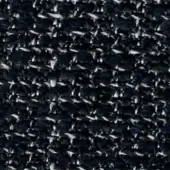 Navy blue tweed fabric texture with white and gray speckles, displaying a dense, diagonal twill weave and visible thread variations.